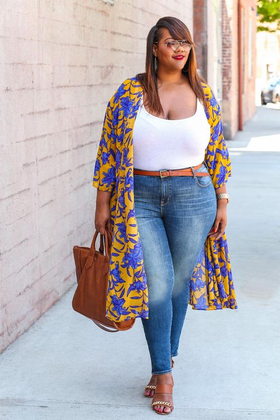 blue jeans, a white top, a bright floral kimono, a brown bag and slippers
