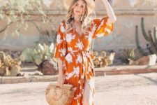 16 an orange wrap dress with a floral print, a straw hat, lace shoes and a cool trendy bag