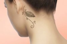 Adorable leaf tattoo design behind the ear