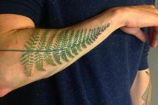 Awesome fern tattoo on the forearm