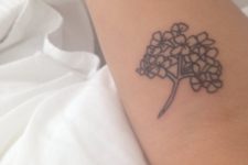 Black-contour hydrangea tattoo