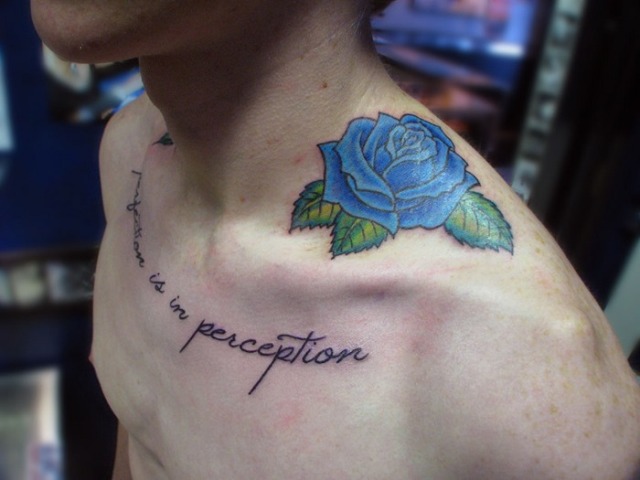 Blue rose on the shoulder