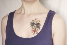 Bouquet of flowers tattoo on the chest
