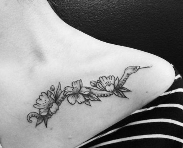 Cherry blossom and snake tattoo