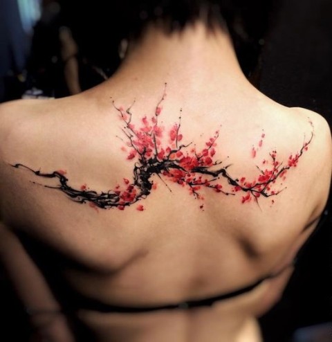Cherry blossom tattoo on the back