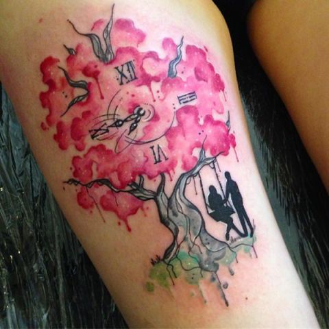 Cherry blossom tree, clock and two persons tattoo on the leg