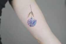 Colorful small tattoo on the arm