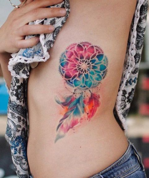 Colorful tattoo on the side