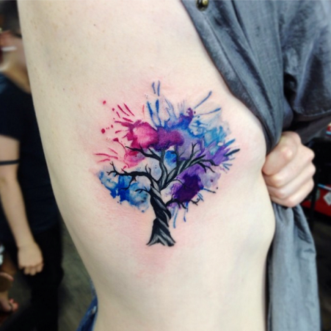 Colorful tattoo on the side