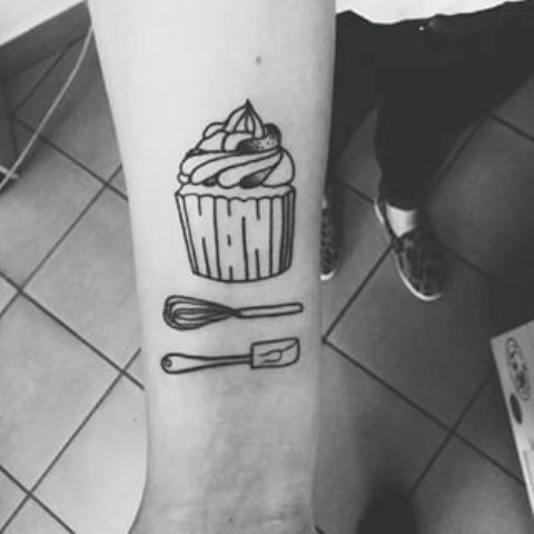 Cupcake and kitchen tools tattoo