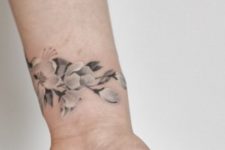 Cute cherry blossom tattoo on the wrist