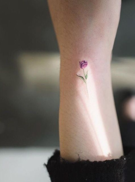 Cute small purple tulip tattoo