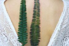 Fern leaf tattoo on the back