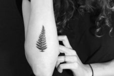 Fern leaf tattoo on the forearm