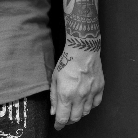 Fern tattoo on the wrist