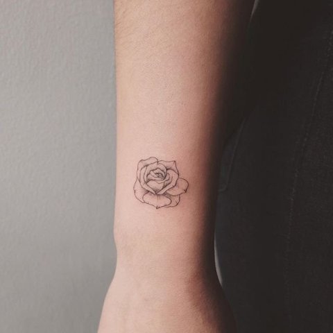 Flower tattoo on the arm