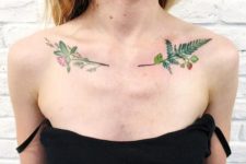 Green fern and flowers tattoo on the chest
