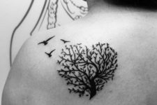 Heart shaped tree tattoo on the shoulder