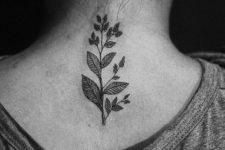 Leaves tattoo on the neck