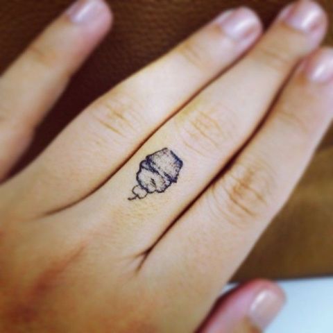 Mini cupcake tattoo on the finger