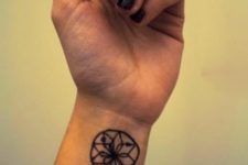 Minimalistic tattoo design on the wrist