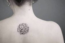 Minimalistic tattoo on the back