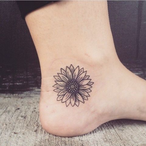 Minimalistic tattoo on the foot