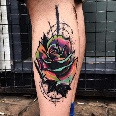 Neon colored tattoo on the leg