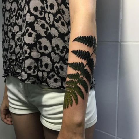 Realistic tattoo on the forearm