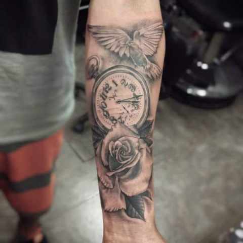 Rose, clock and bird tattoo