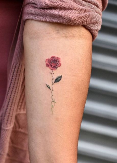 small hand rose tattoo