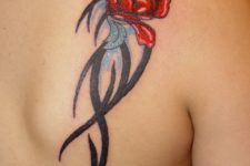 Rose tribal tattoo on the back