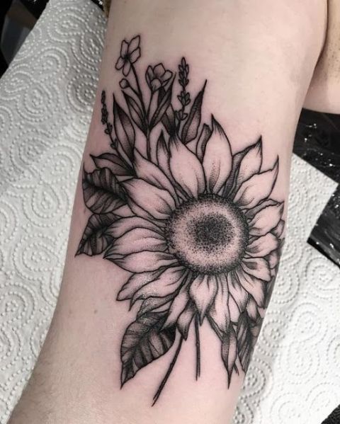 Sunflower tattoo on the arm