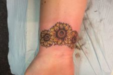flower wrist tattoo