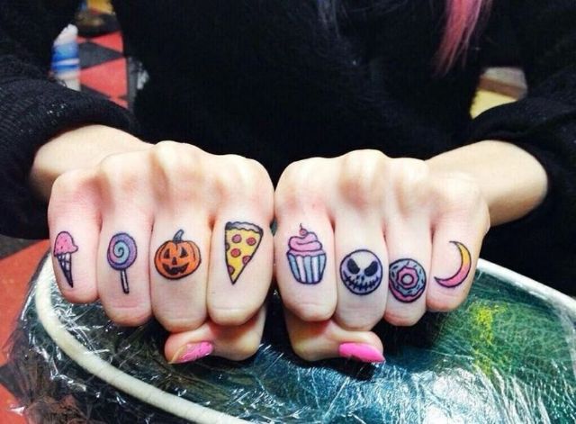 Cute tiny tattoos on the fingers