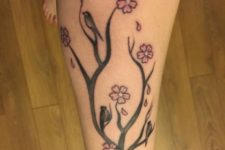 Tree, birds and flowers tattoo