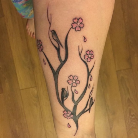 Tree, birds and flowers tattoo
