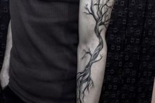 Tree with roots tattoo on the hand