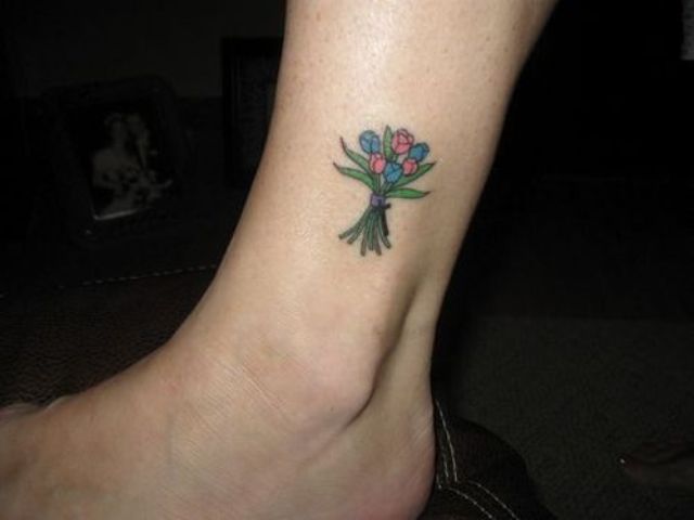 Tulip bouquet tattoo on the ankle