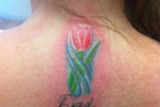 neck tulip tattoo