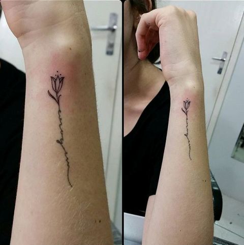 Tulip tattoo with word