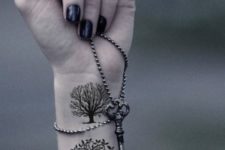 Two tree tattoos on the wrist
