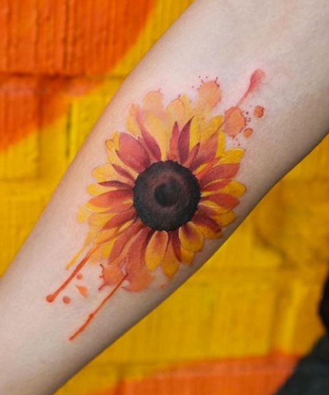 Watercolor tattoo on the arm