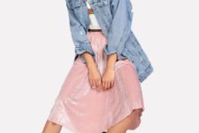 With printed t-shirt, pale pink pleated skirt and white boots