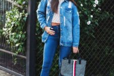 With striped crop top, skinny jeans, striped heels and printed bag