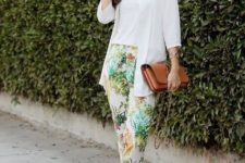 With white top, white shirt, green sandals and brown leather clutch