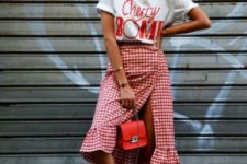 04 a white printed t-shirt, a red wrap gingahm skirt,white sneakers and a red bag