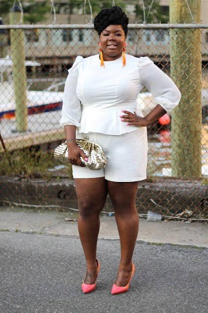 a white top,shorts, bright shoes and sparkling shoes plus bold tassel earrings