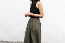 With black top and olive green maxi skirt
