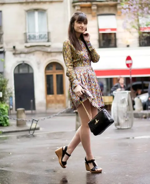 With floral dress and chain strap bag